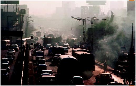 During the morning rush hour, the Miguel Hidalgo area of Mexico City is clogged with traffic and smog. (©Stephanie Maze/Corbis. Reproduced by permission.)