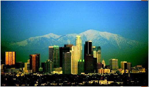 The Los Angeles skyline with mountain peaks visible in the background. (© Mark L. Stephenson/Corbis. Reproduced by permission.)